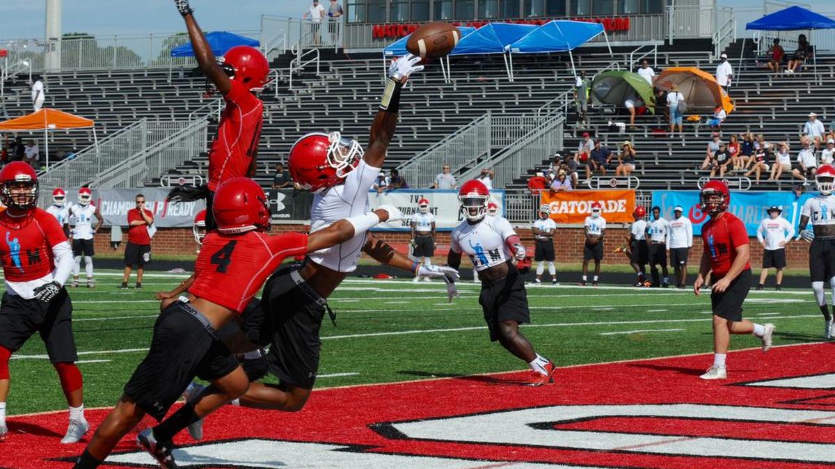 Nation Ford defensive backs break up a Woodward Academy (Ga.) pass into the end zone Friday morning during the first day of the Cam Newton Foundation 7-on-7 national championship tournament. Friday’s action determined seeding for Saturday’s double elimination knockout tournament.