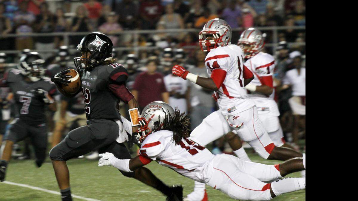 
South Pointe senior defensive back Chris Smith (diving) committed to play football at the University of South Carolina on Friday evening. 
