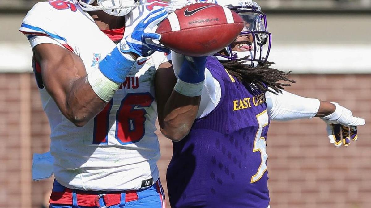 SMU's Courtland Sutton catches a touchdown pass in front of East Carolina's Corey Seargent during the first half of an NCAA college football game, Saturday, Nov. 12, 2016, at Dowdy-Ficklen Stadium in Greenville, N.C.