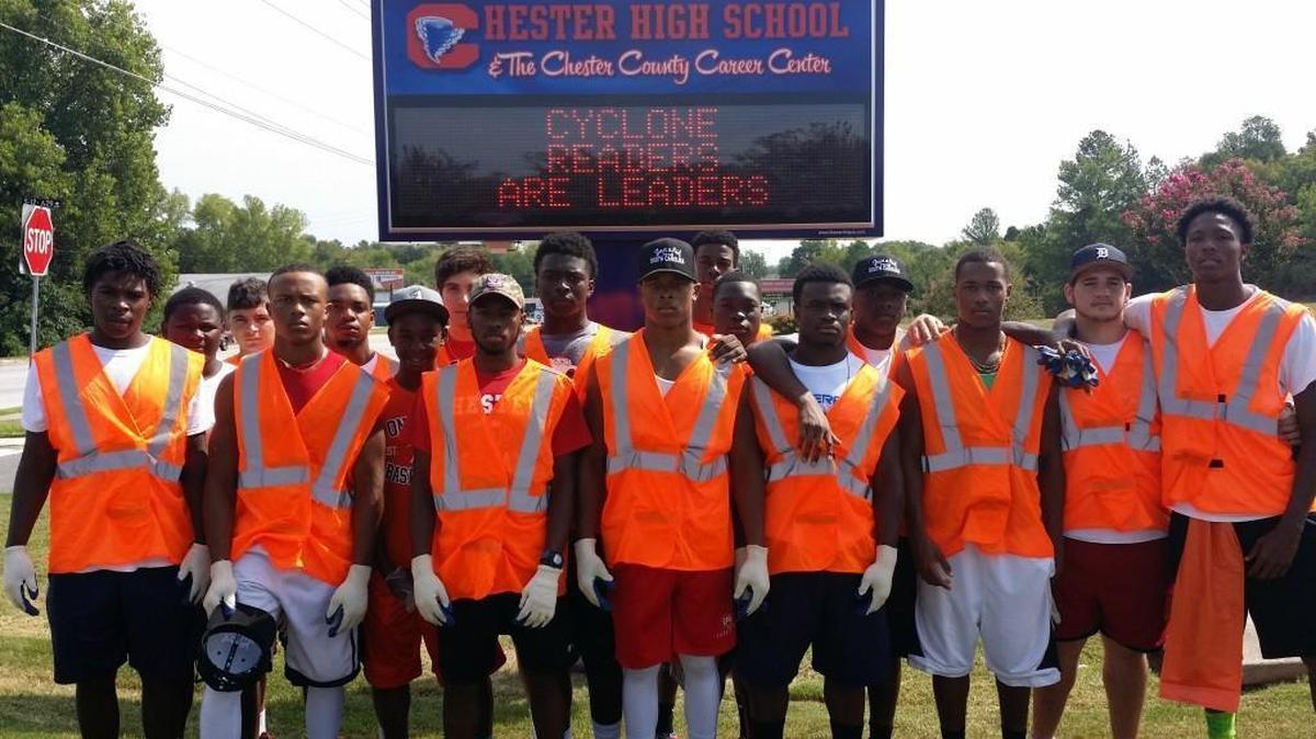
Chester High School football players spent Aug. 29 cleaning up the roads near their school.
