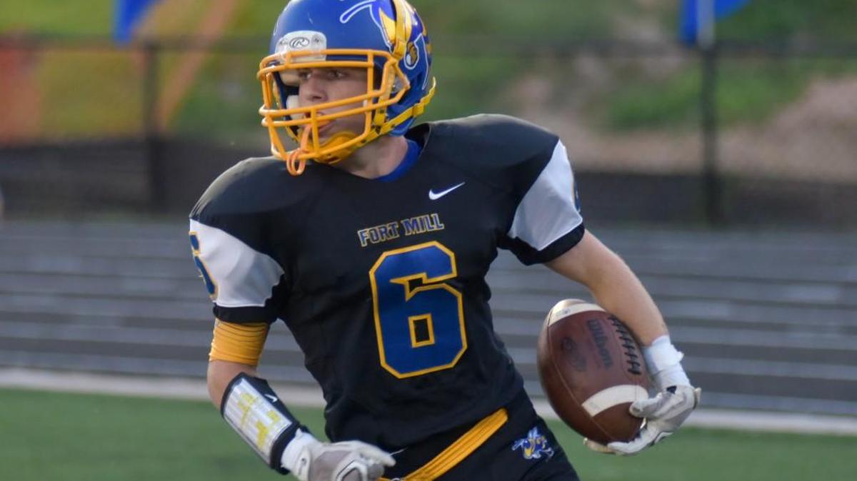 Fort Mill's Jackson Randall runs the ball into the end zone to score the first touchdown of Friday night's home game against Orangeburg-Wilkinson.