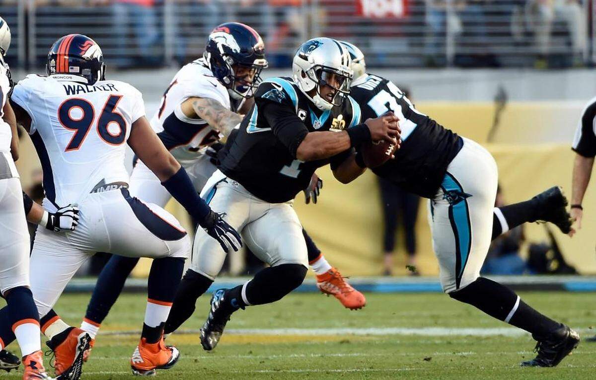 Carolina Panthers quarterback Cam Newton (1) takes off past Denver Broncos defensive end Vance Walker (96) in the first half of Super Bowl 50. The Denver Broncos won, 24-10, at Levi's Stadium in Santa Clara, CA on Sunday, February 7, 2016. Walker, the former Fort Mill Yellow Jacket, made one tackle in the game.