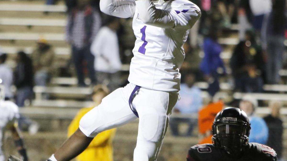 Rock Hill hosts Northwestern Friday October 30 at District 3 Stadium in Rock Hill. Northwestern's Jamario Holley catches a pass from Gage Moloney for a two point conversion after a touchdown in the first quarter. Rock Hill's Nick Truesdale defends on the play.
