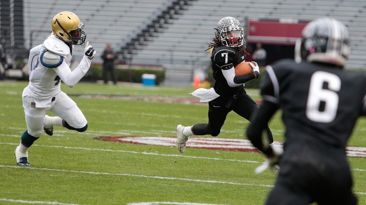 
York's Wally Wilmore cuts to the outside as York faces Spartanburg Saturday in the South Carolina 4A Division II high school football state championship.
