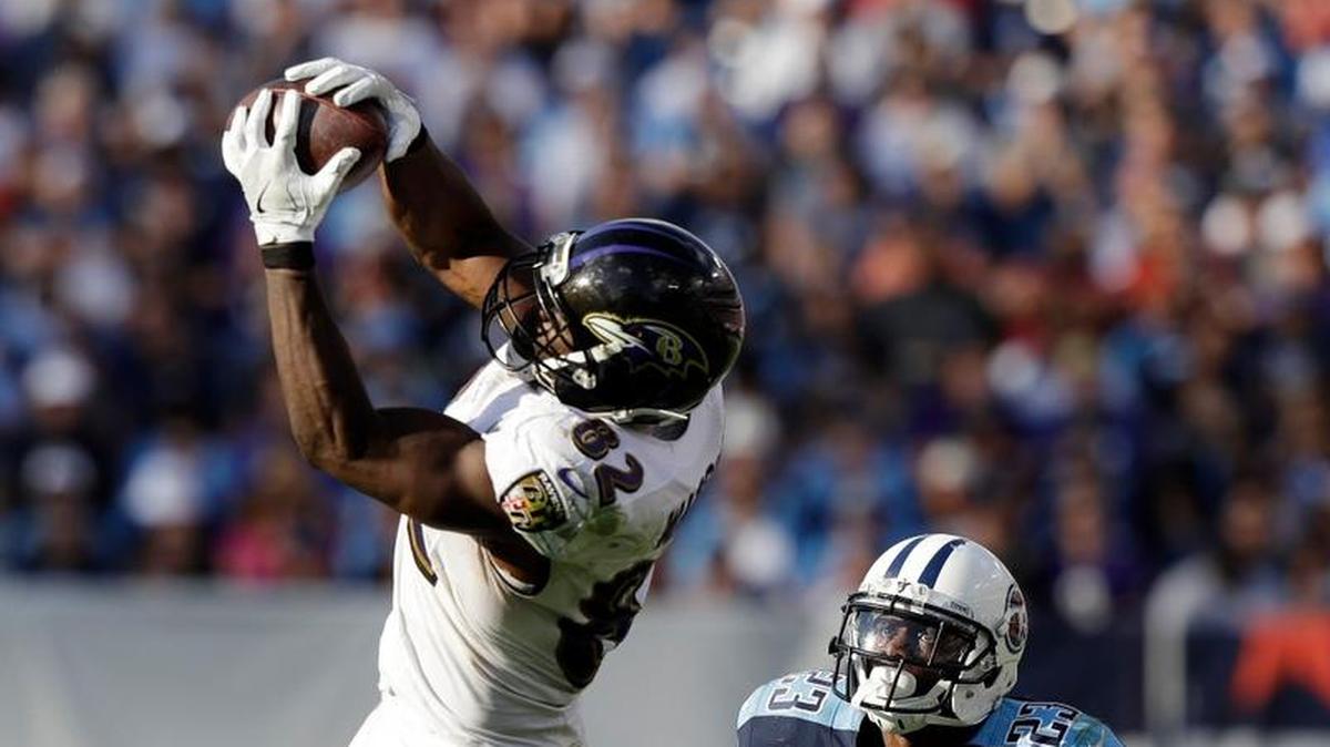 Baltimore Ravens tight end Benjamin Watson (82) catches a pass in front of Tennessee Titans cornerback Brice McCain (23) in the second half of an NFL football game Sunday, Nov. 5, 2017, in Nashville, Tenn. The Titans won 23-20.