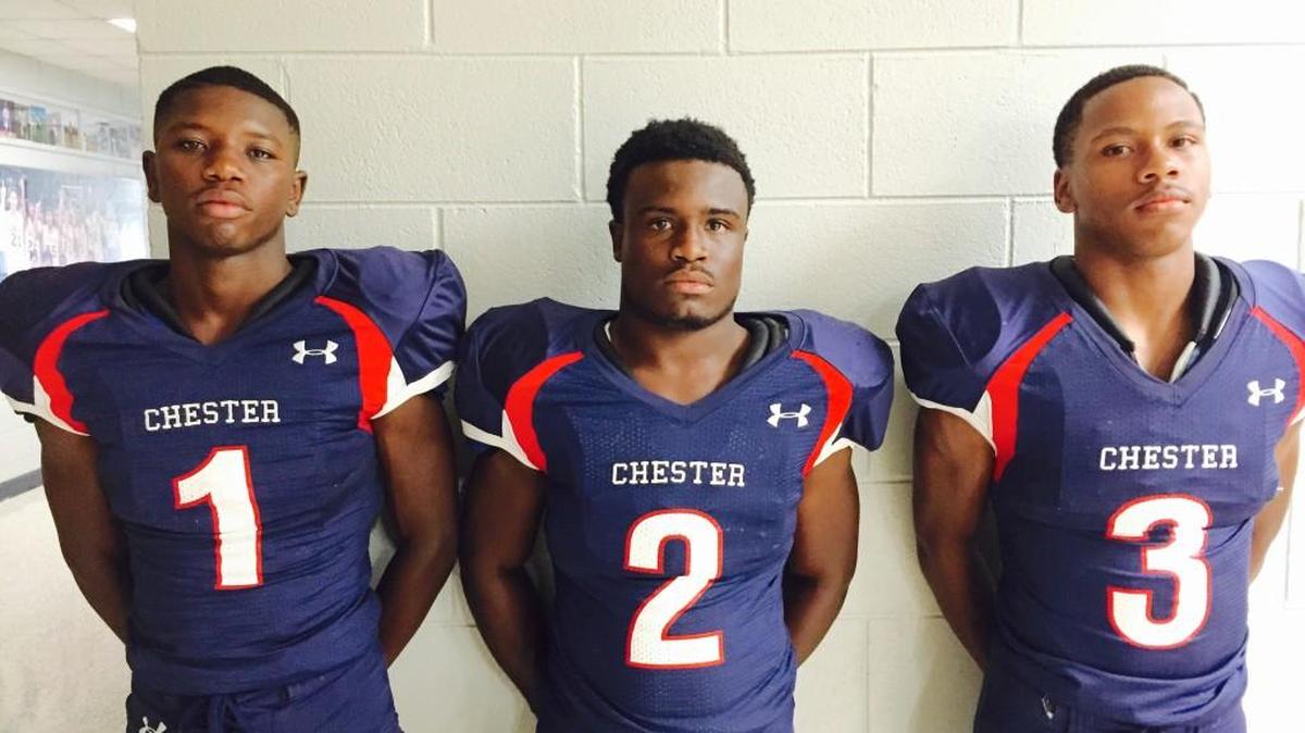 Chester’s Dre Johnson (middle) and Malik Williams (right) won Tri-County awards on Tuesday.