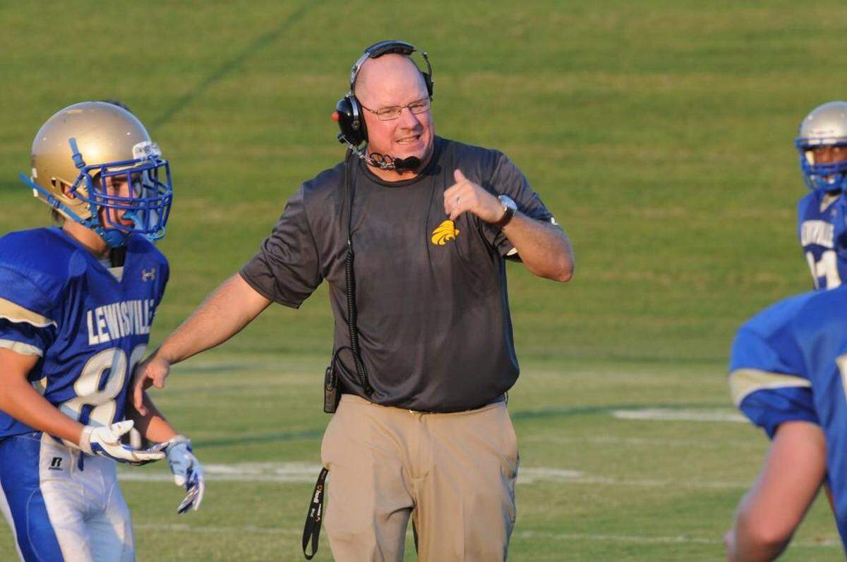 File photo from 2015: Will Mitchell leads his Lewisville team through a drill in only his third season on the job.