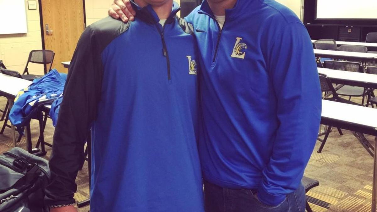 Josh Stepp (left) and his twin brother, Justin after Lexington defeated Spartanburg last Friday.