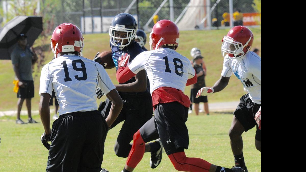 
Lancaster’s Cordarius Tinsley hauled in this pass Saturday against Jonesboro (Ga.) High School during the Cam Newton Foundation 7-on-7 tournament at Nation Ford. Tinsley is one of the young Bruins having to emerge for Lancaster this summer.
