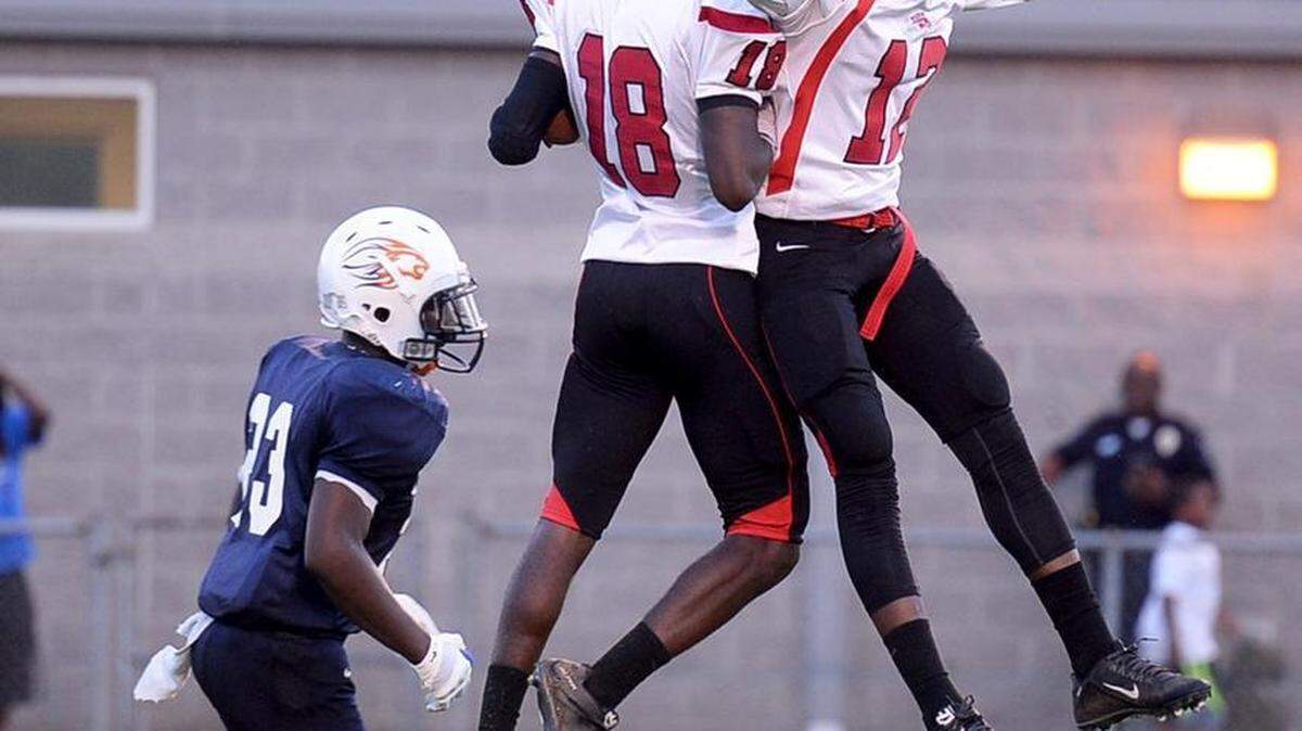 South Pointe’s Lorenzo Wells and Quay Brown (12) celebrate Wells' touchdown against Vance back in September. The Stallions and Lancaster have locked up the top two playoff seeds from Region 3-3A.