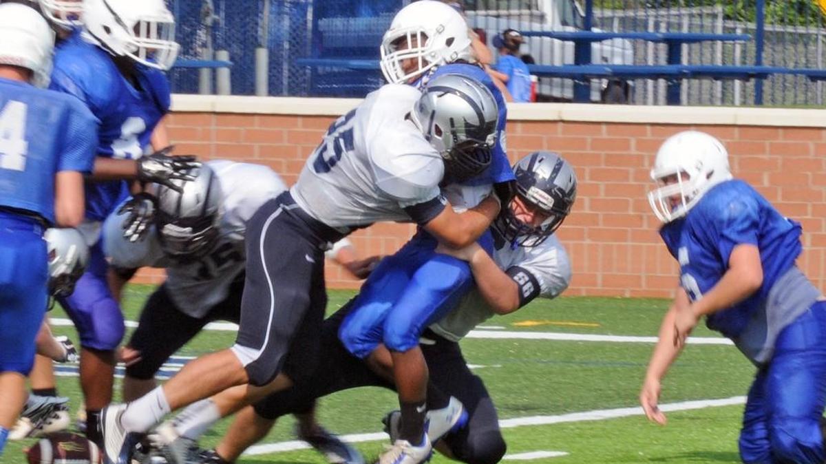 
Clover junior A.J. Pennington forced a fumble during a scrimmage two weeks ago against Broome. The Blue Eagles need more game-changing plays like that from their defense in 2015.

