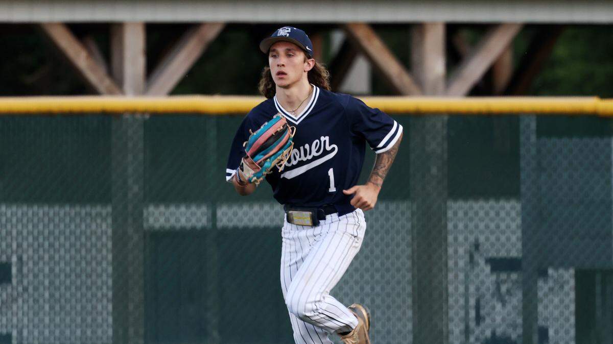 Clover’s Cade Pilgrim runs between innings Thursday during a game against Fort Mill High School in Clover.