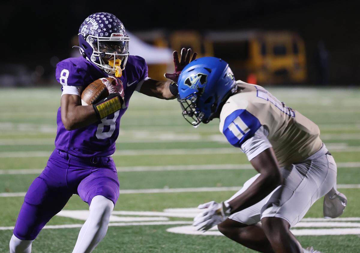Northwestern's Jonathan Spurgeon holds his hand out to stop Indian Land's Bailey Carzell on Friday, Nov. 28, 2025 in Rock Hill, South Carolina.