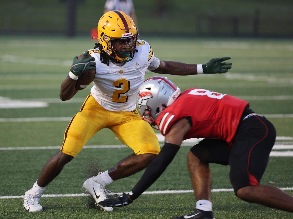 West Charlotte's Donte Nicholson tries to skirt around South Pointe's Kadin Watkins Friday, Sept. 5, 2025 in Rock Hill, S.C.