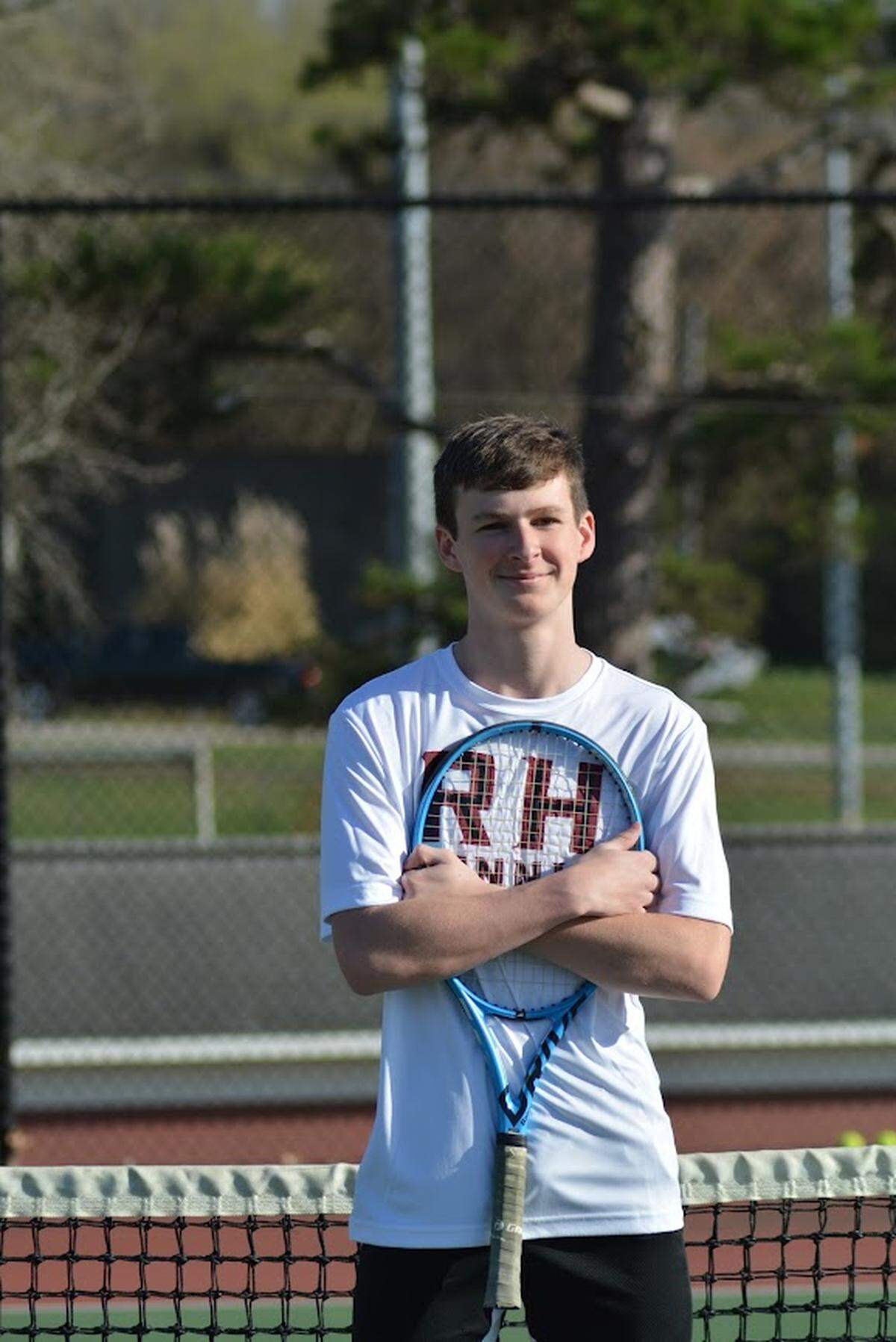 Wilson, a senior, won all three of his matches in straight sets, winning 36 of 39 games.