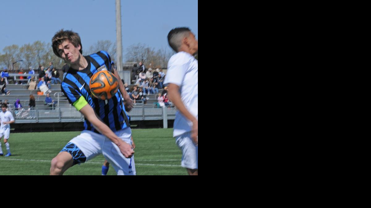 
Indian Land’s Garrett Gerdes didn't catch this header cleanly during Saturday’s Manchester Cup match against Clover.
