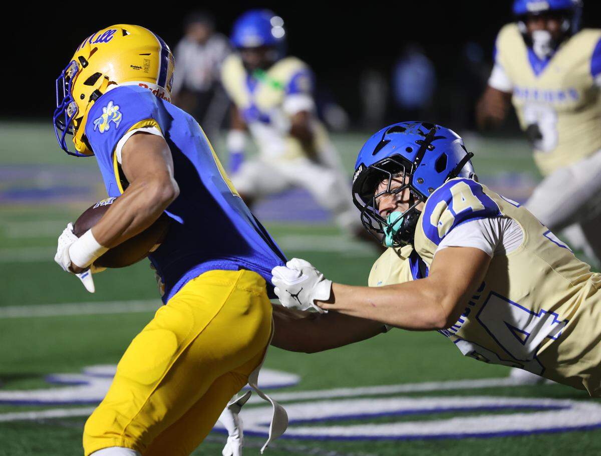 Indian Land's C.J. Petri pulls down Fort Mill's Jameson Terrell Friday, Oct. 23, 2025, in Fort Mill, S.C.