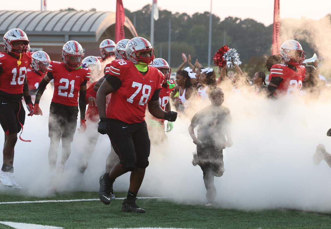 South Pointe High School varsity football players run onto the field Friday, Sept. 5, 2025 in Rock Hill, S.C.