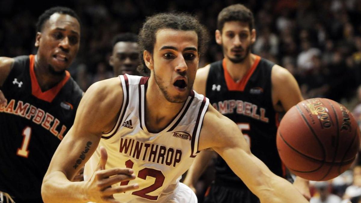 Winthrop’s Xavier Cooks goes after the ball Sunday at Winthrop Coliseum.