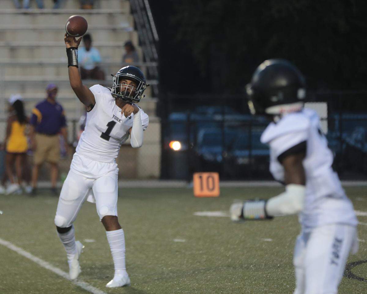 Herald file: Ayden Davis of York looks for a receiver at a 2021 preseason jamboree in District Three Stadium. The Cougars will be in District Three Stadium again when they play Rock Hill.