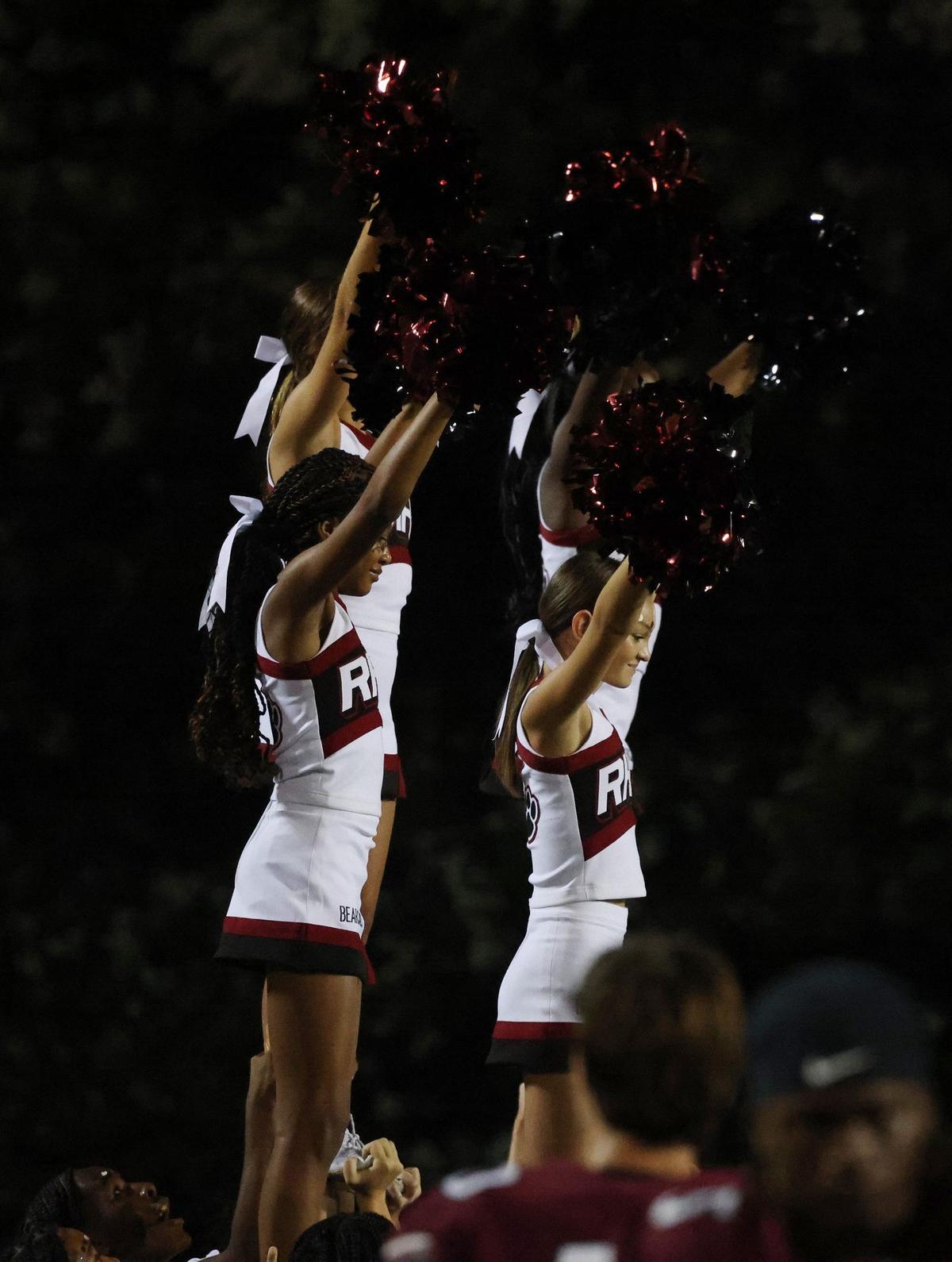 Rock Hill High School cheerleaders perform Friday at the WRHI Football City USA scrimmage in Rock Hill.