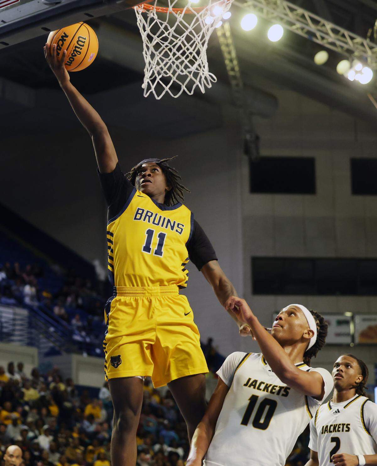 Lancaster’s Jacarey Ballard shoots the ball against North Augusta’s Daron Dunbar Friday at the Class 4A state championships in Florence