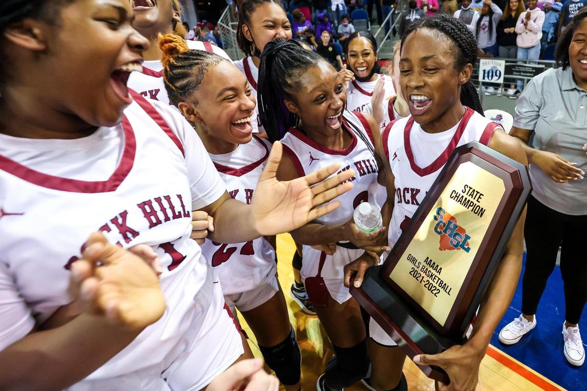 Rock Hill Bearcats players celebrate after winning the Girls 5A State Championship Game at the University of South Carolina Aiken Thursday, March 3, 2022.