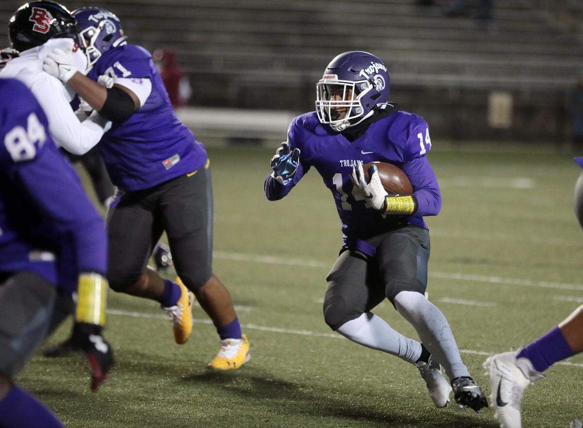 Northwestern’s Turbo Richard carries the ball.