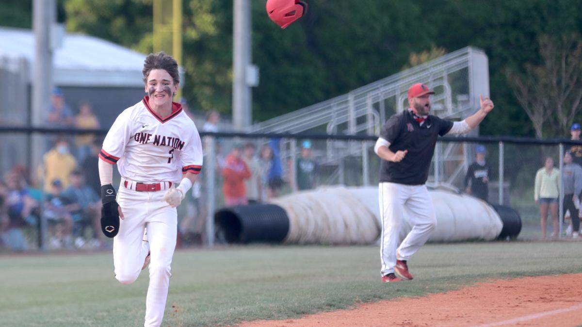Nation Ford’s Jerrick Foster loses his helmet while running to home plate
