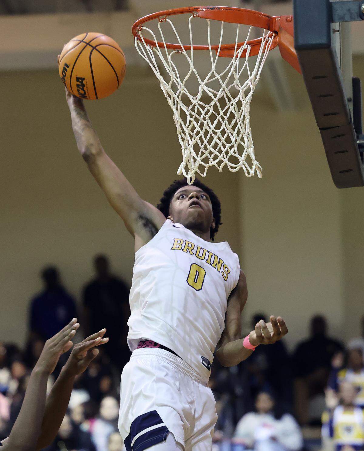 Lancaster’s Jordan Watford dunks the ball Tuesday as the Bruins take on the South Pointe Stallions in Lancaster.