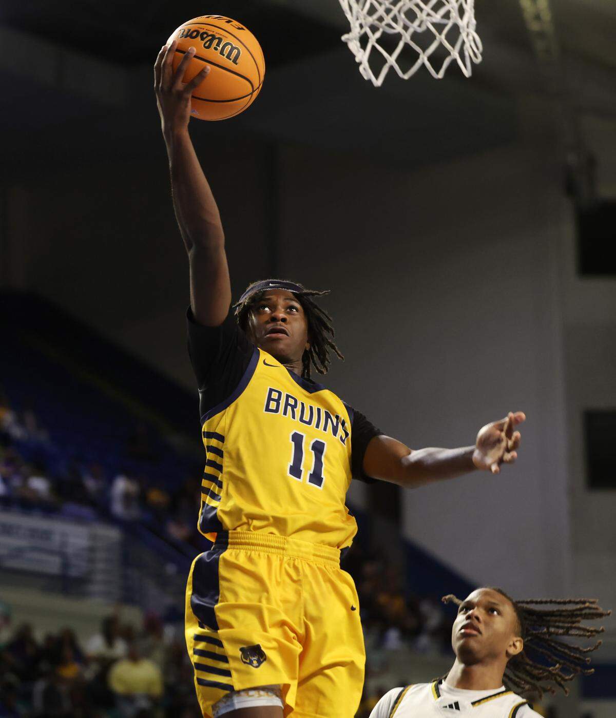 Lancaster’s Jacarey Ballard shoots the ball Friday at the Class 4A state championships in Florence