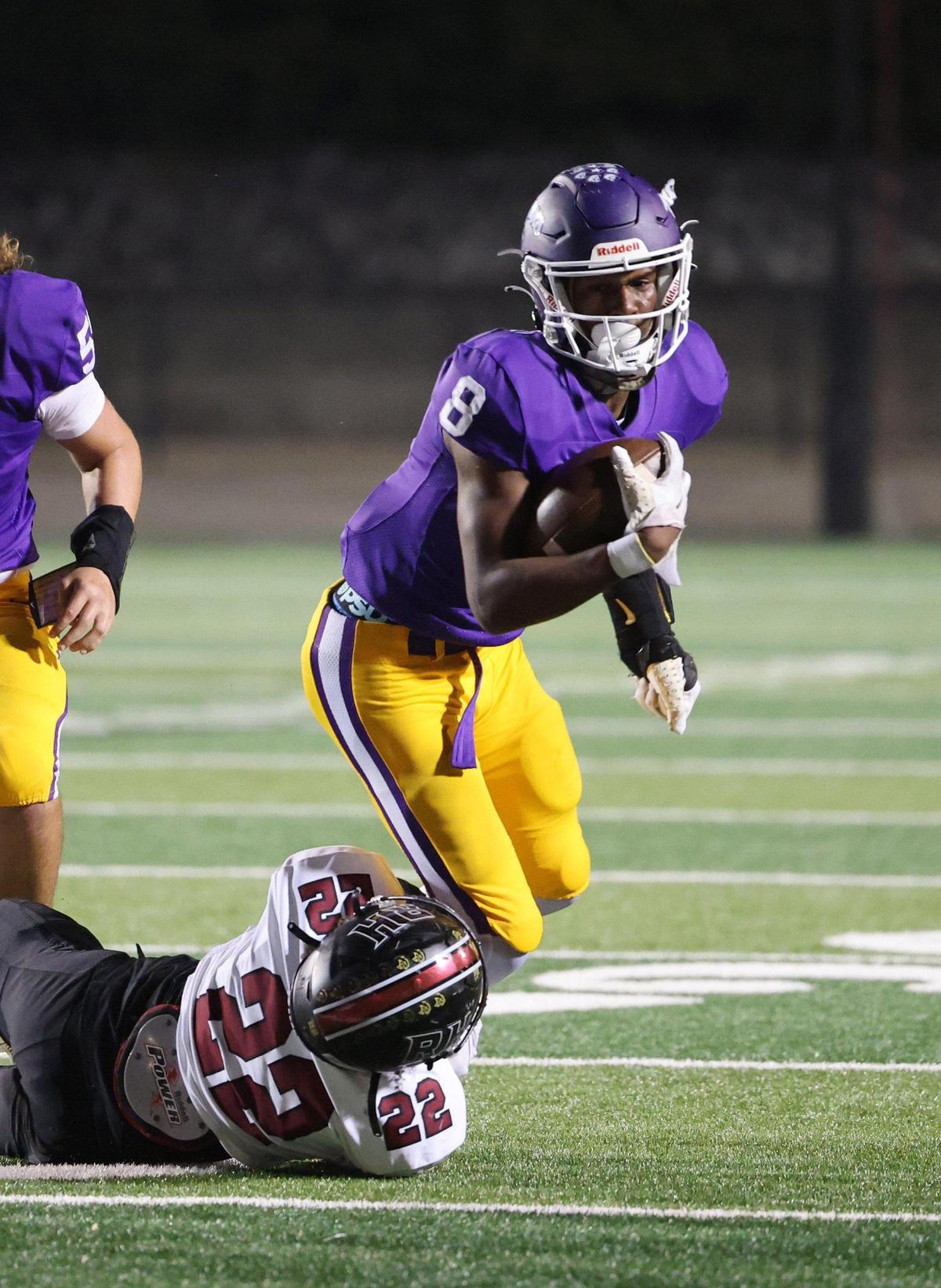 Northwestern’s Zymier Gordon-Miles carries the ball against Rock HIll’s Josiah Beatty Friday, Oct. 18, 2024 in Rock Hill, S.C.