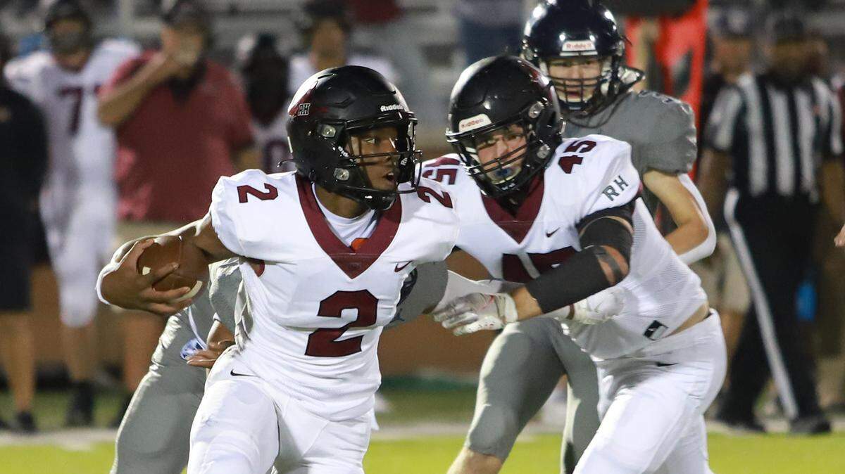 Rock Hill quarterback Matthew Wilson looks for an opening in Rock Hill’s win over Clover Friday night (09/24/2021).