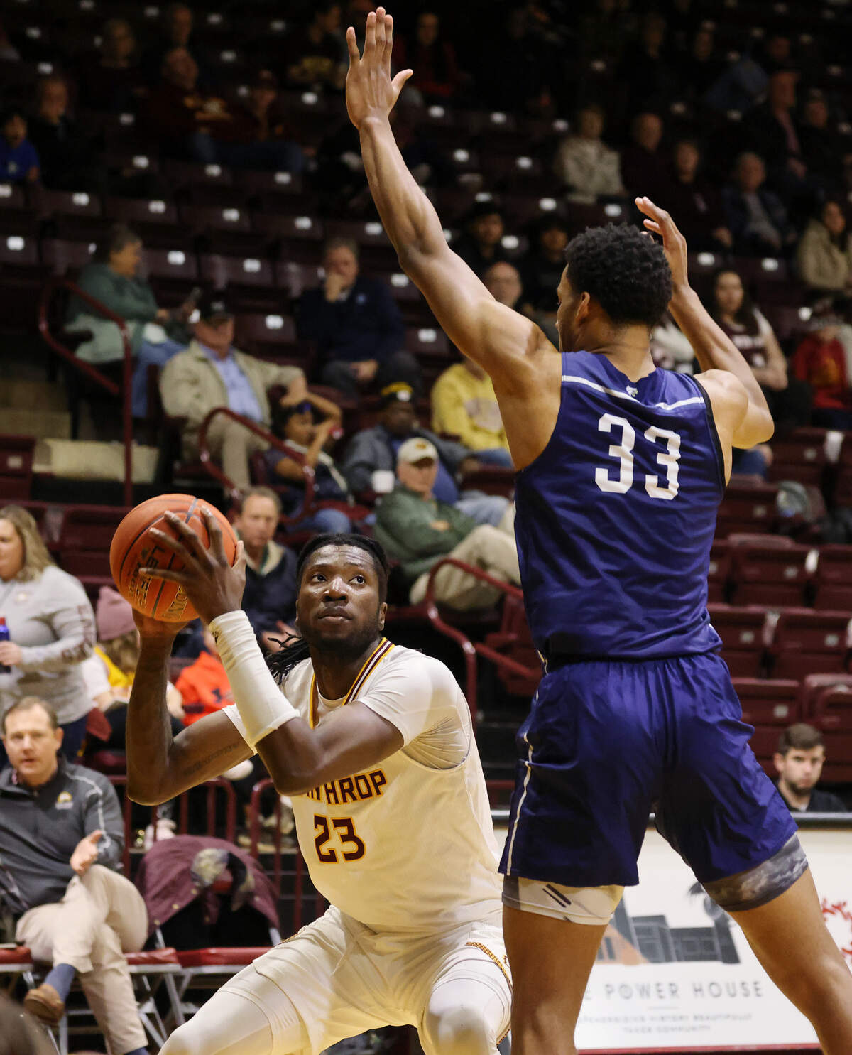 Winthrop’s Michael Moore looks to the basket against Toccoa Falls’ Tyriq Perry.