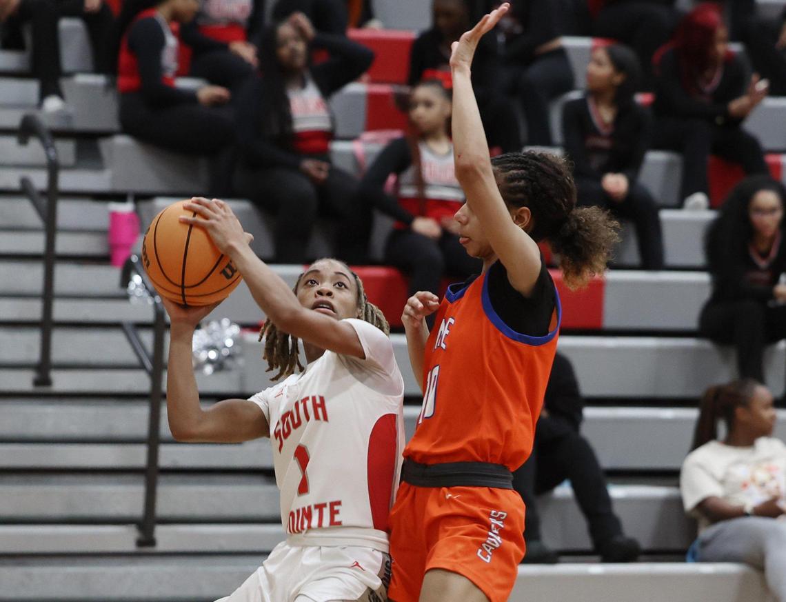 Soutth Pointe’s Kaleigh Lucas takes the shot against Richland Northeast’s Janiyah Cosby Thursday in Rock Hill.