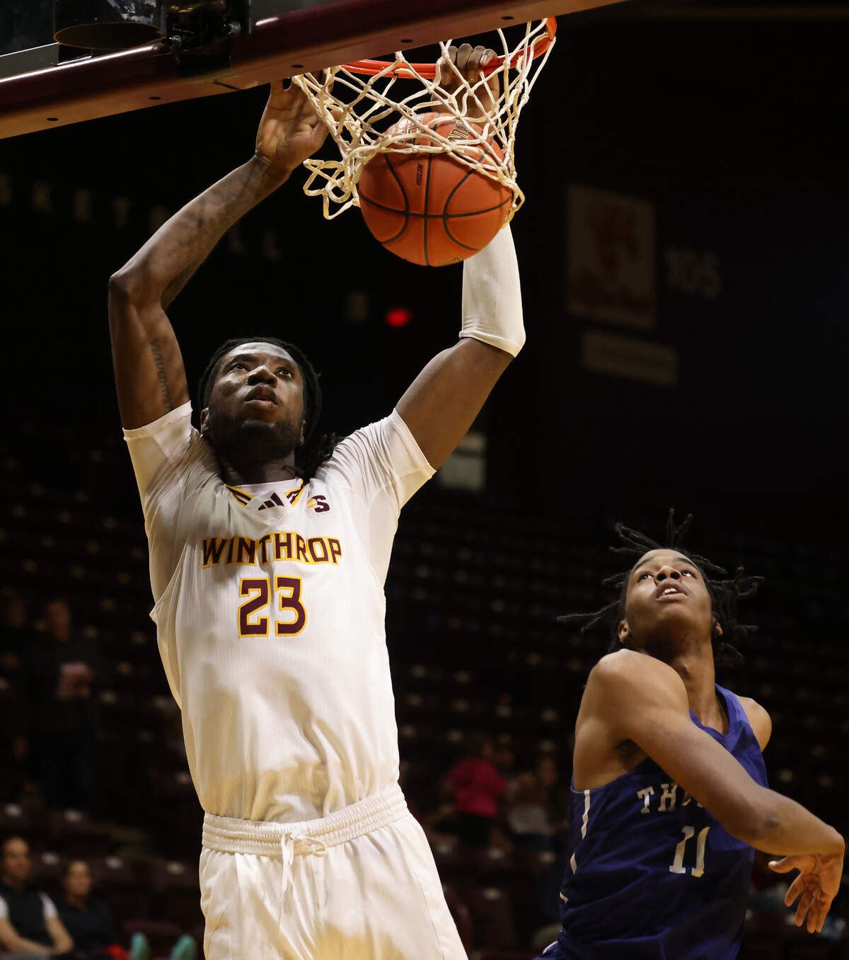 Winthrop’s Michael Moore dunks the ball Friday at the Winthrop Coliseum.