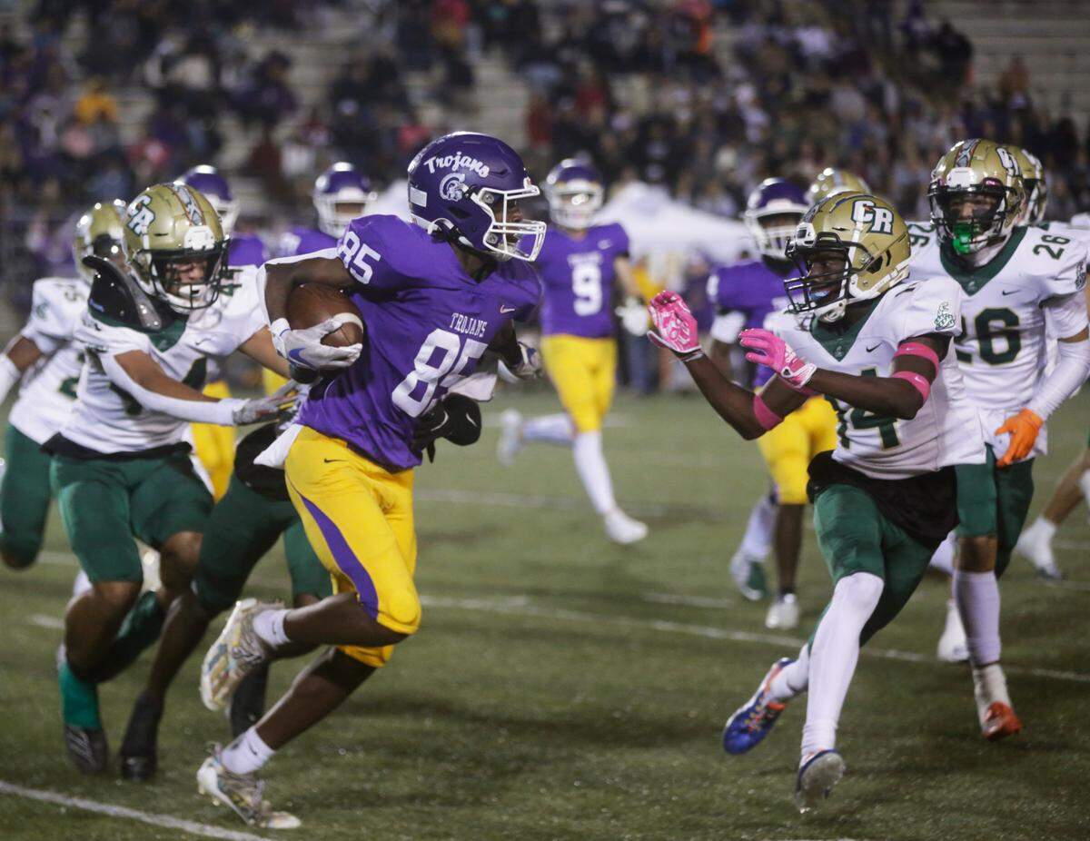 Northwestern’s Jalen Logan (85) tries to get past Catawba Ridge’s Donnell Williamson (14) on Friday, Oct. 28, 2022 in Rock Hill.