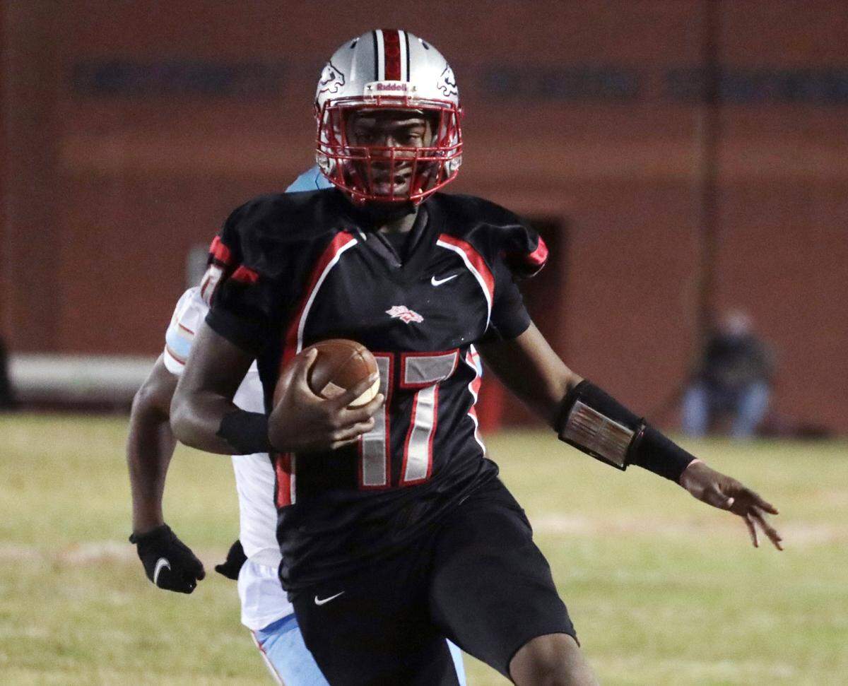 South Pointe’s Zay McCrorey carries the ball Friday as the Stallions take on the A.C. Flora Falcons in Rock Hill.
