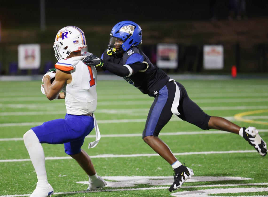 Indian Land’s Sequel Patterson tackles Marvin Ridge’s Alex Voss.