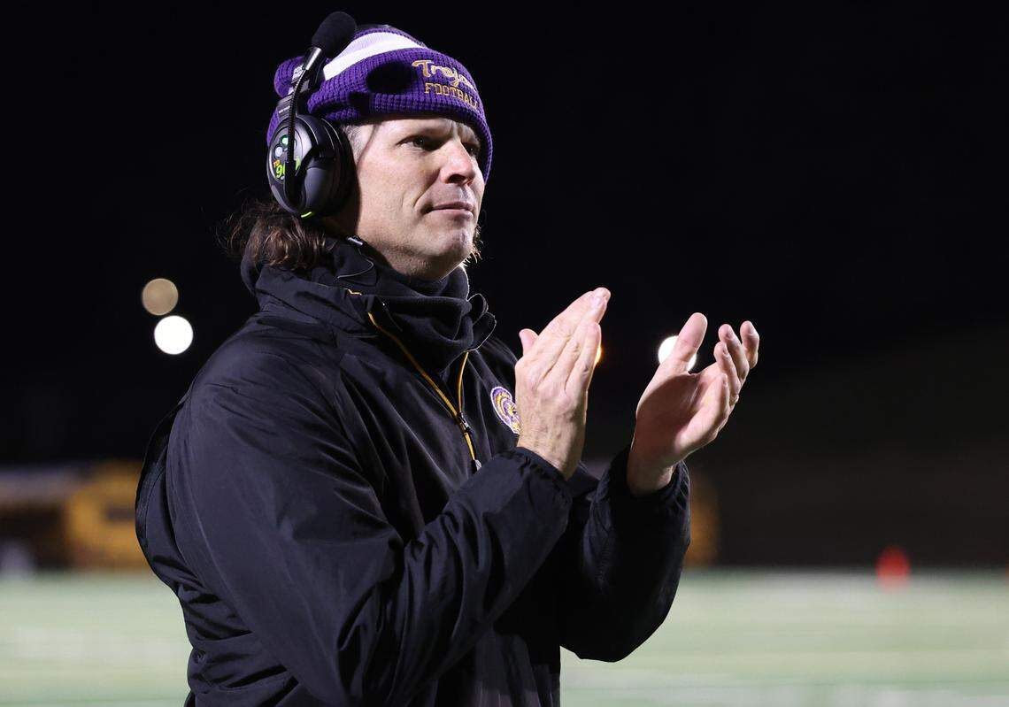 Northwestern coach Page Wofford claps after his team scores a touchdown Friday in Rock Hill, S.C.