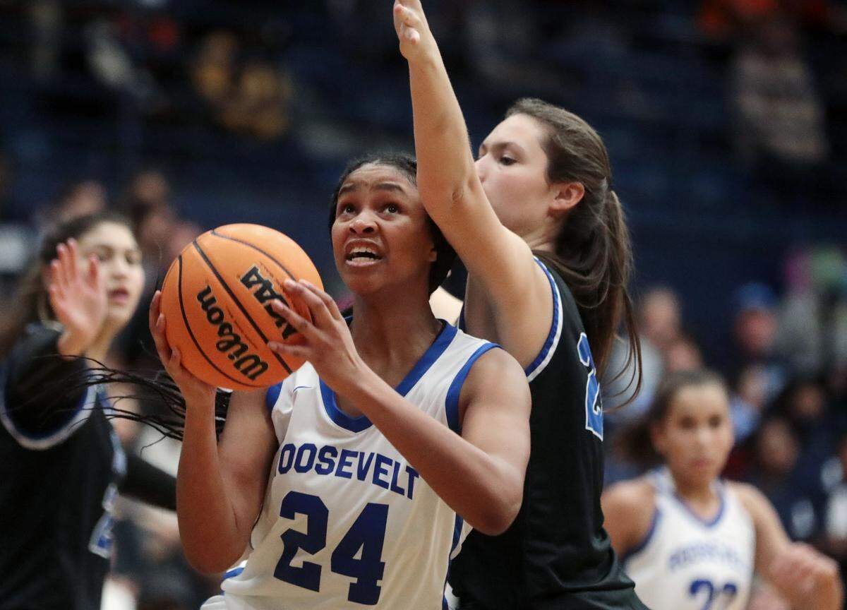 Fort Mill’s Ella Marker, right, puts pressure on Clover’s Indya Massey.