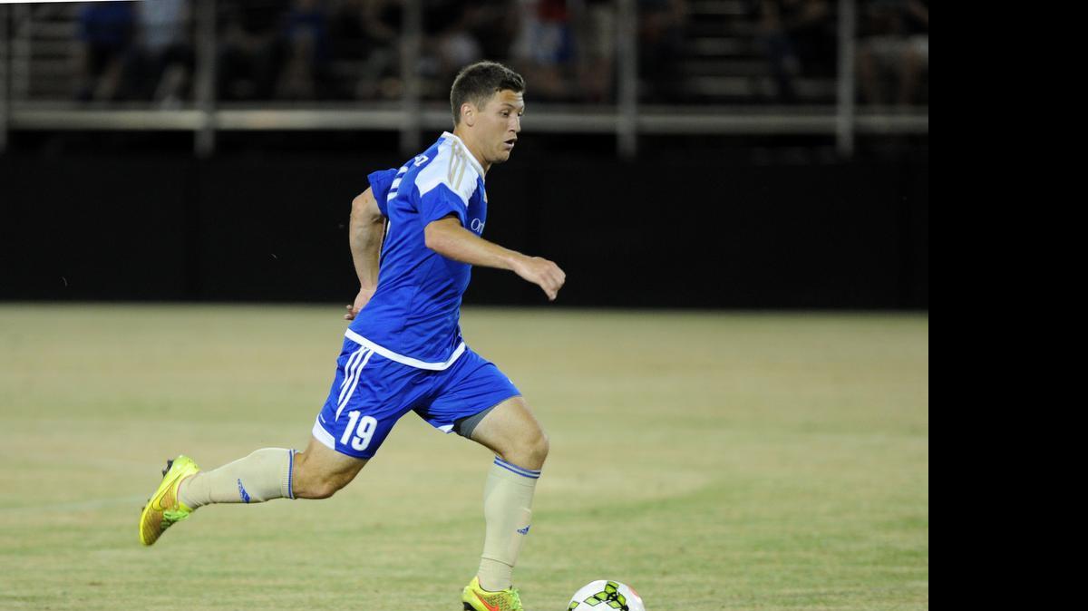 
Charlotte’s Enzo Martinez works his way down the pitch against the Richmond Kickers.
