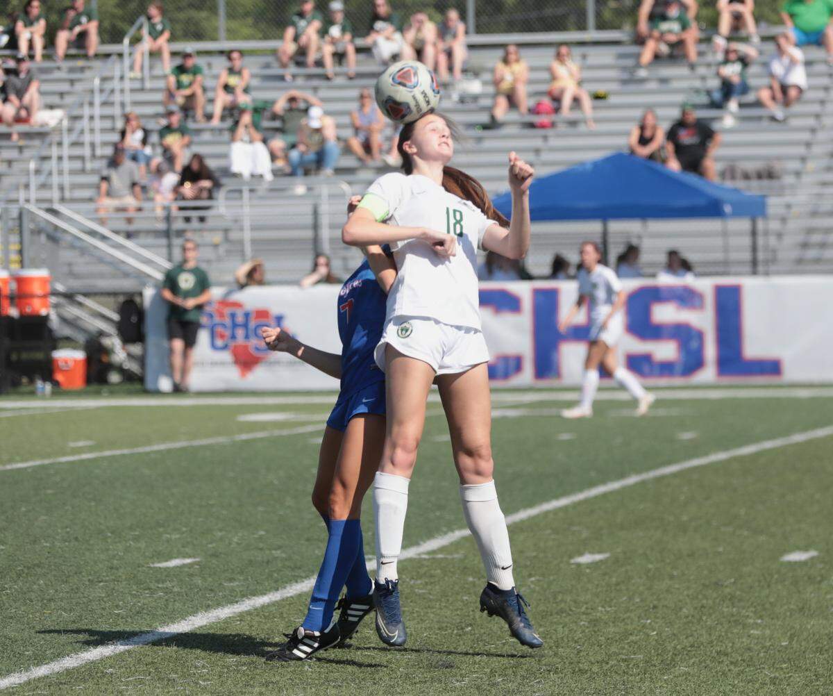 Catawba Ridge’s Maren White heads a ball at the South Carolina 2A championship game in Irmo in May 2021.
