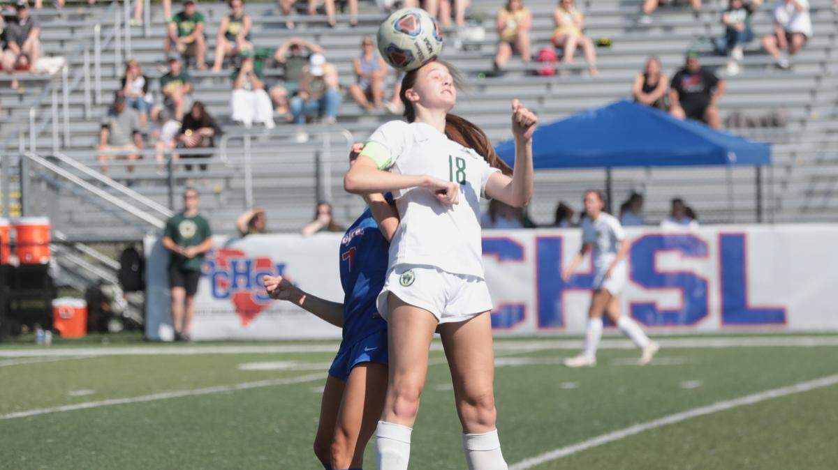 Catawba Ridge’s Maren White heads a ball at the South Carolina 2A championship game in Irmo in May 2021.