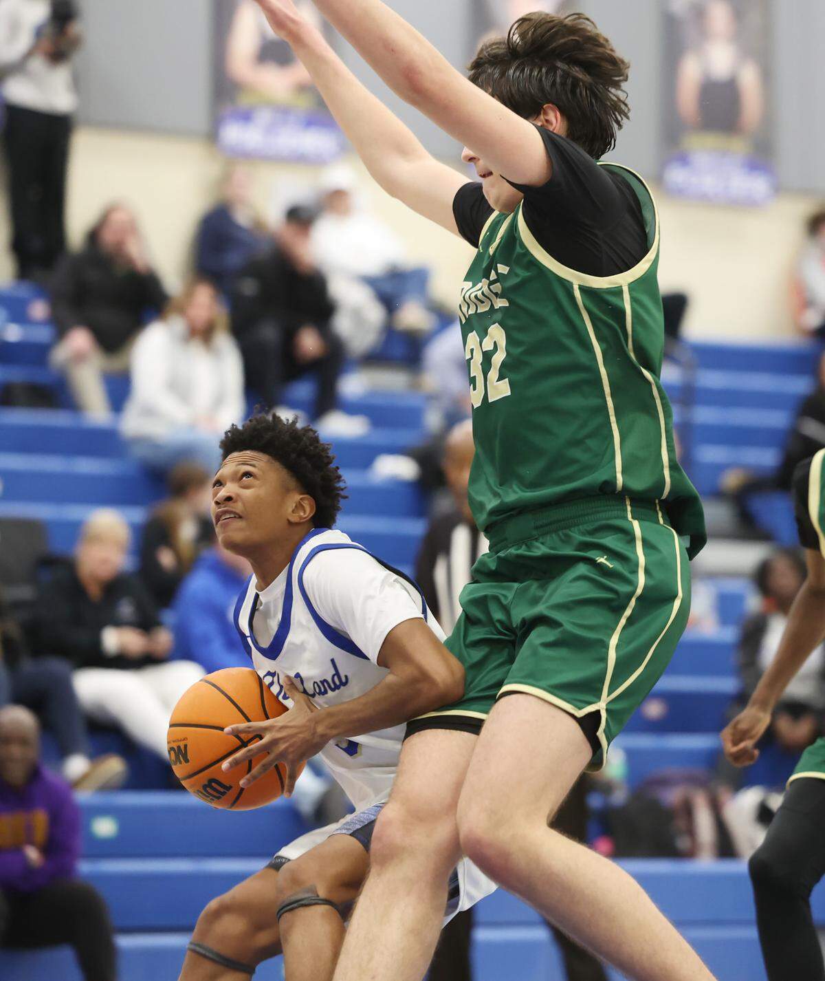 Indian Land’s Michael Jones tries to put up a shot around Catawba Ridge’s Mark Caslaru Thursday in Indian Land.