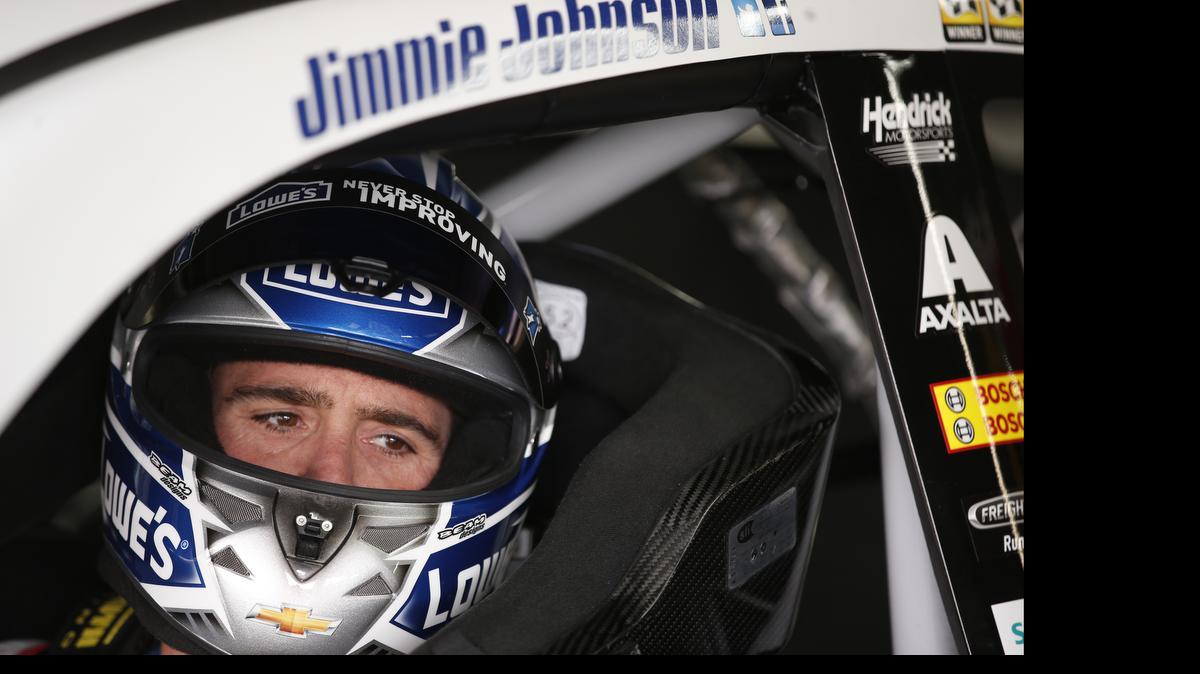 
Jimmie Johnson sits in his car during practice for the NASCAR Sprint All-Star auto race in Concord, Friday, May 15, 2015.
