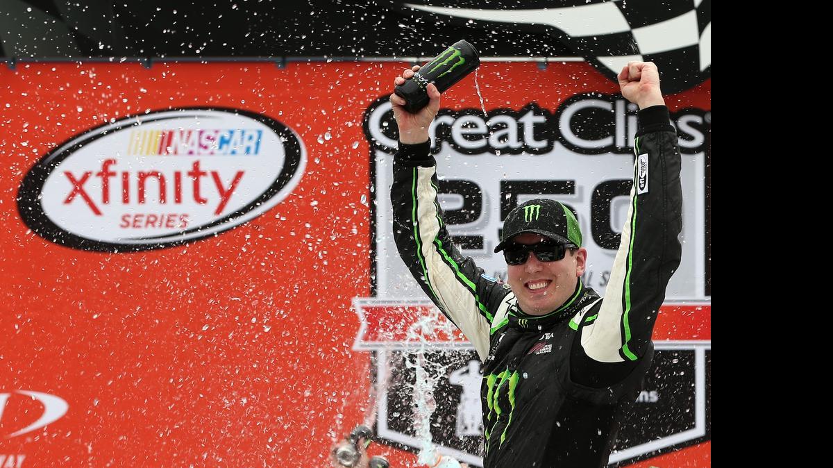 
Kyle Busch had already returned to NASCAR Sprint Cup competition this season but on Saturday he returned to Victory Lane, winning the Xfinity Series Great Clips 250 at Michigan International Speedway. The win came in Busch’s first Xfinity Series start since he broke his right leg and left foot in a wreck at Daytona in February.


