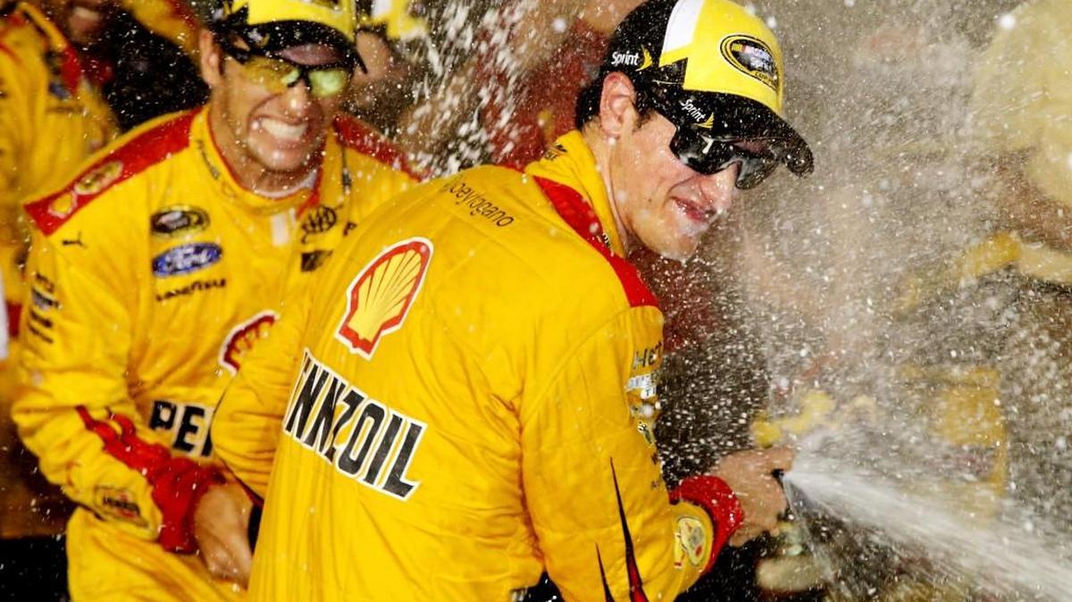 
Joey Logano, celebrates with champagne in Victory Lane after winning  Saturday’s IRWIN Tools Night Race at Bristol Motor Speedway in Bristol, Tenn.
