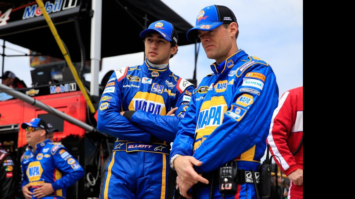 
Chase Elliott speaks with his crew chief Kenny Francis before the start of Sunday’s NASCAR Sprint Cup Series Toyota Owners 400 at Richmond International Raceway. Elliott qualified a solid 16th on Friday and spent the entire 400-lap race Sunday on the lead lap and finished a respectable 16
th
.
