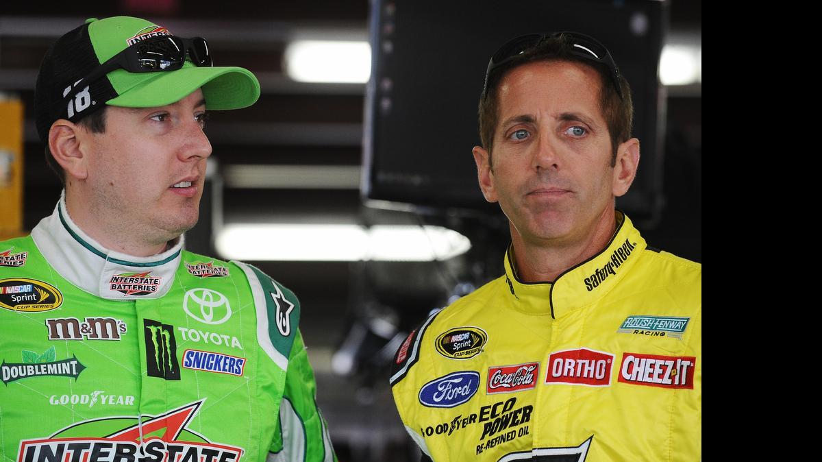 They might be competitors on the track, but Kyle Busch, left, and Greg Biffle stand side by side in their support of NASCAR’s new aerodynamic rules packages.